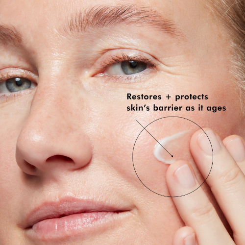 Close-up of a person applying cream to their face with text about skin care benefits.