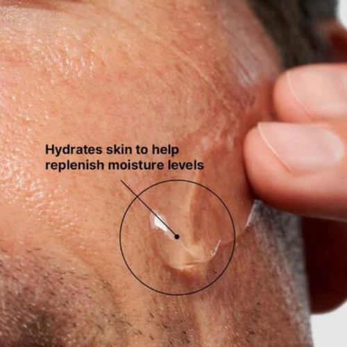 Close-up of skin with a product applied, labeled for hydrating and replenishing moisture levels.